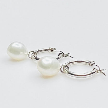 Side view of sterling hoop with removable pearl drop