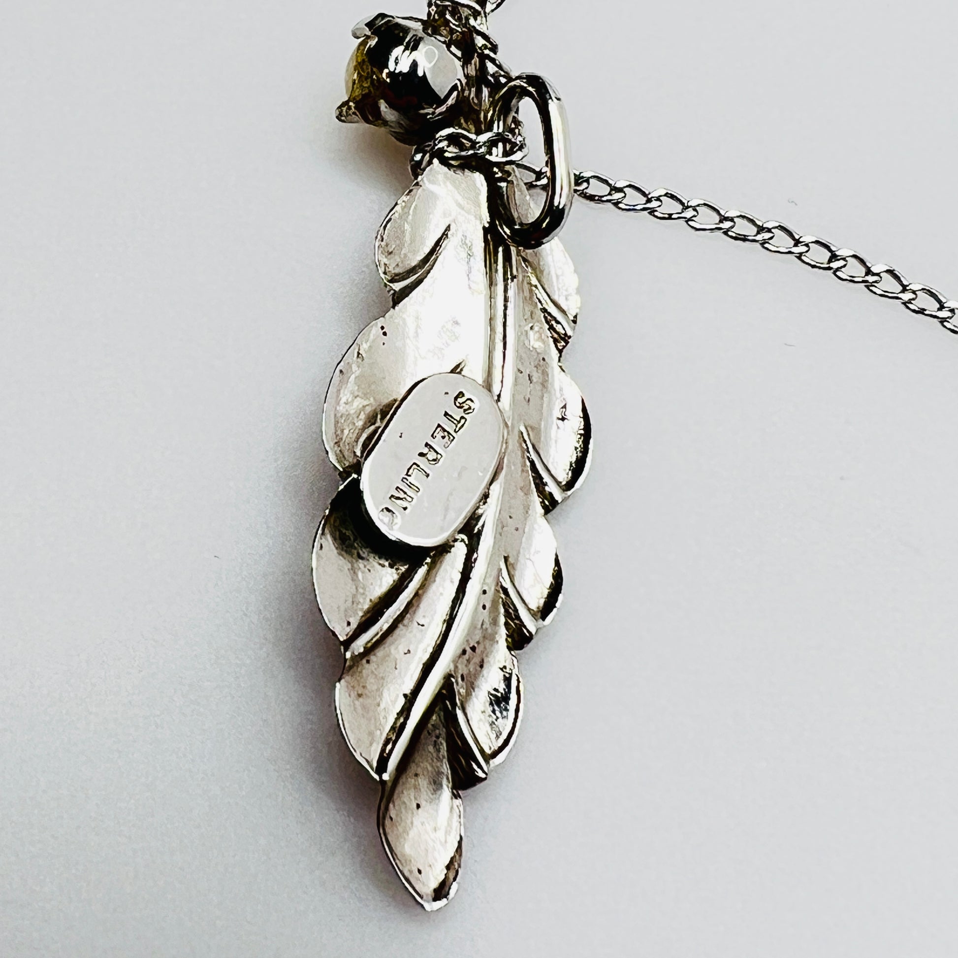 Pearl accented sterling silver drop pendant