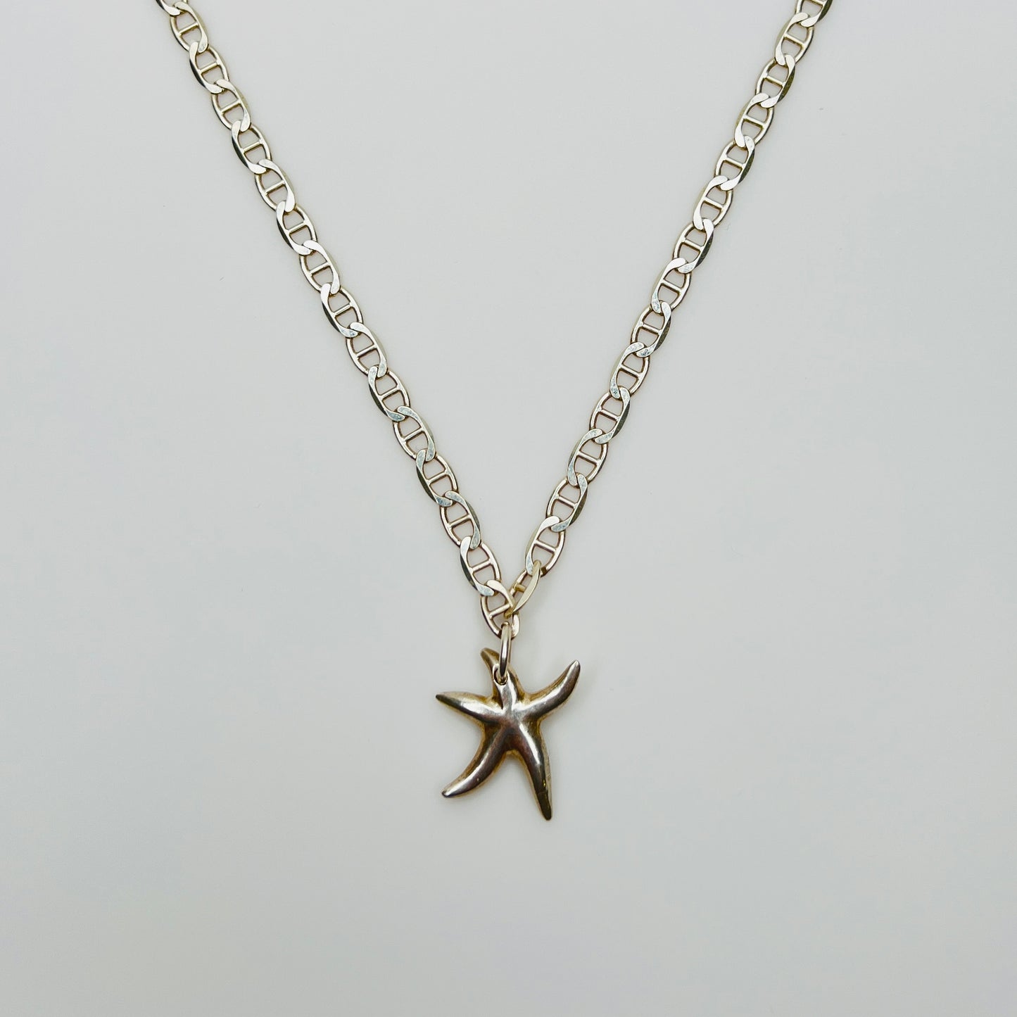 Sterling silver starfish pendant on mariner link chain necklace