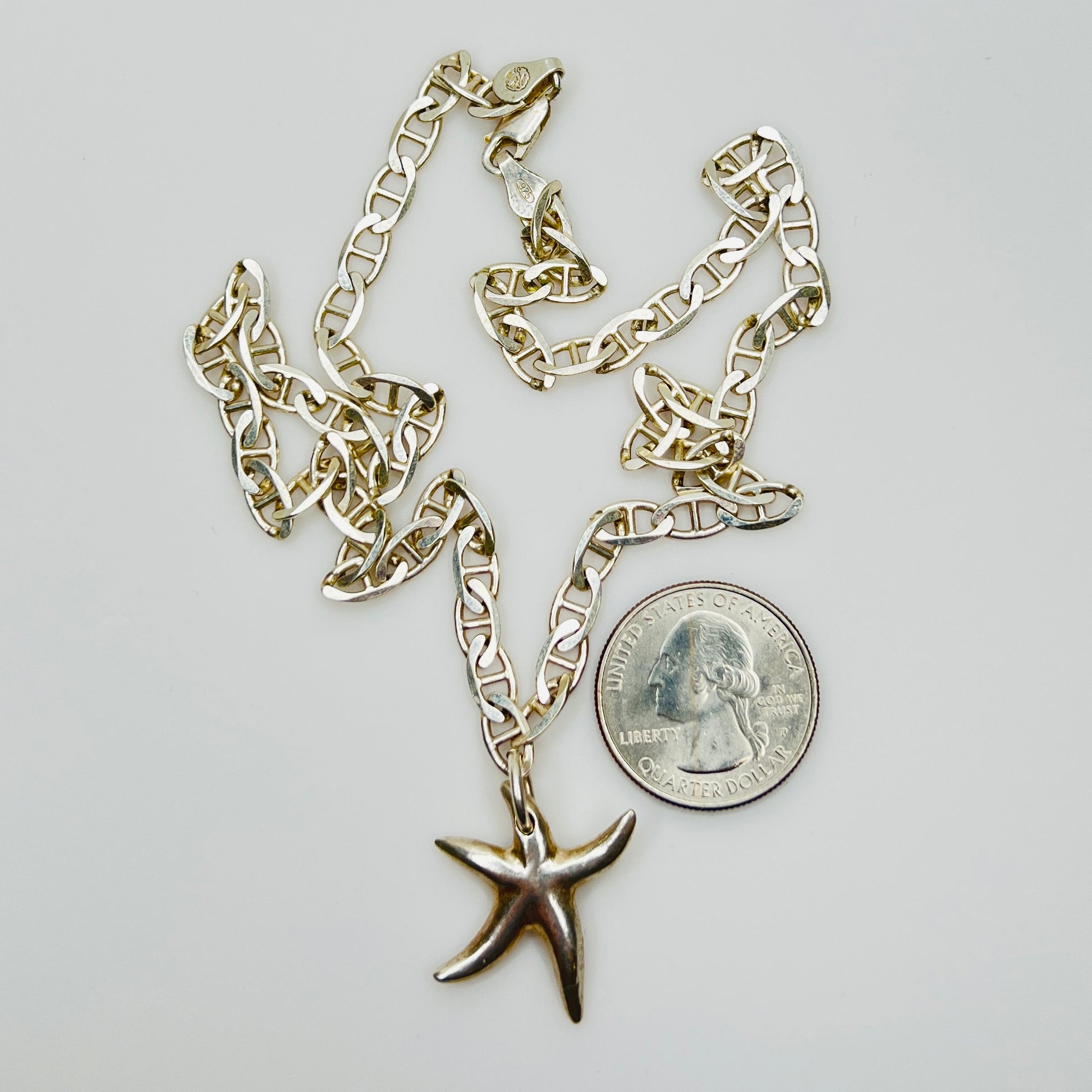 Sterling silver starfish pendant on mariner link chain necklace