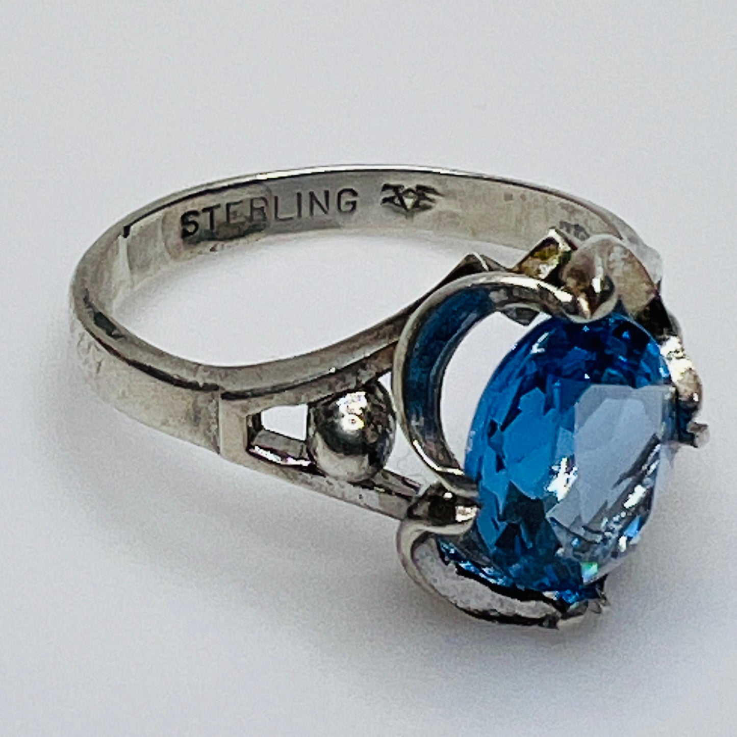 Inside band showing “STERLING” stamp and unidentified maker’s mark