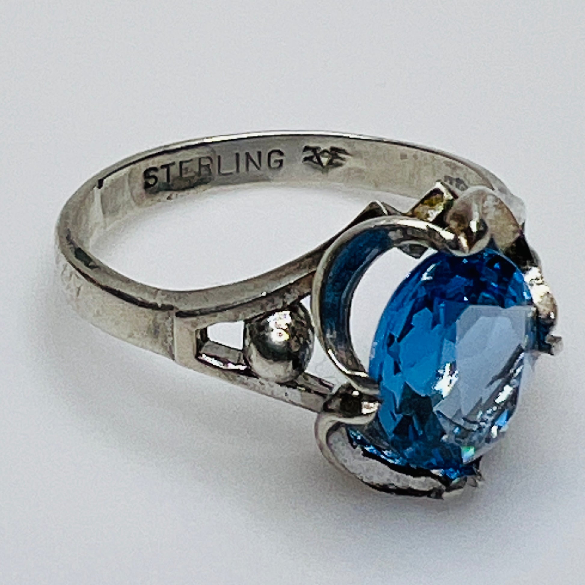 Inside band showing “STERLING” stamp and unidentified maker’s mark