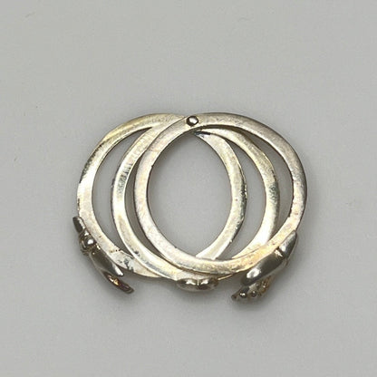 Open view of 3-part sterling silver Claddagh ring showing hands and heart