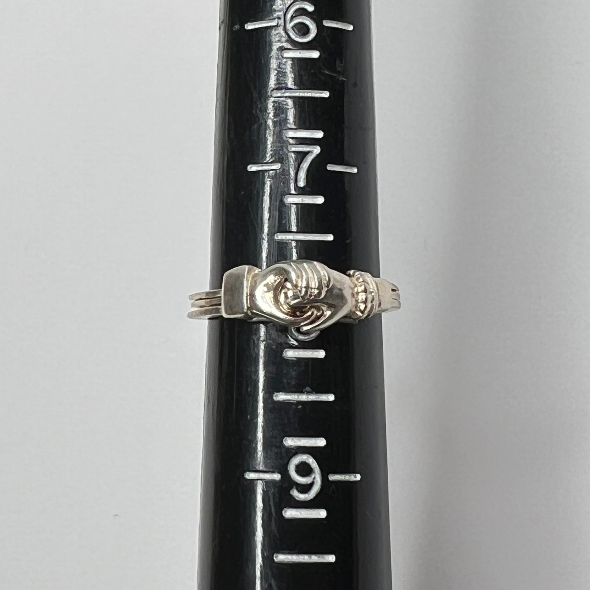 Vintage sterling silver Claddagh puzzle ring with hands and heart motif