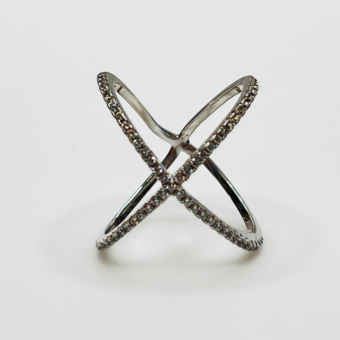 Detail of intersecting pavé CZ bands on silver ring