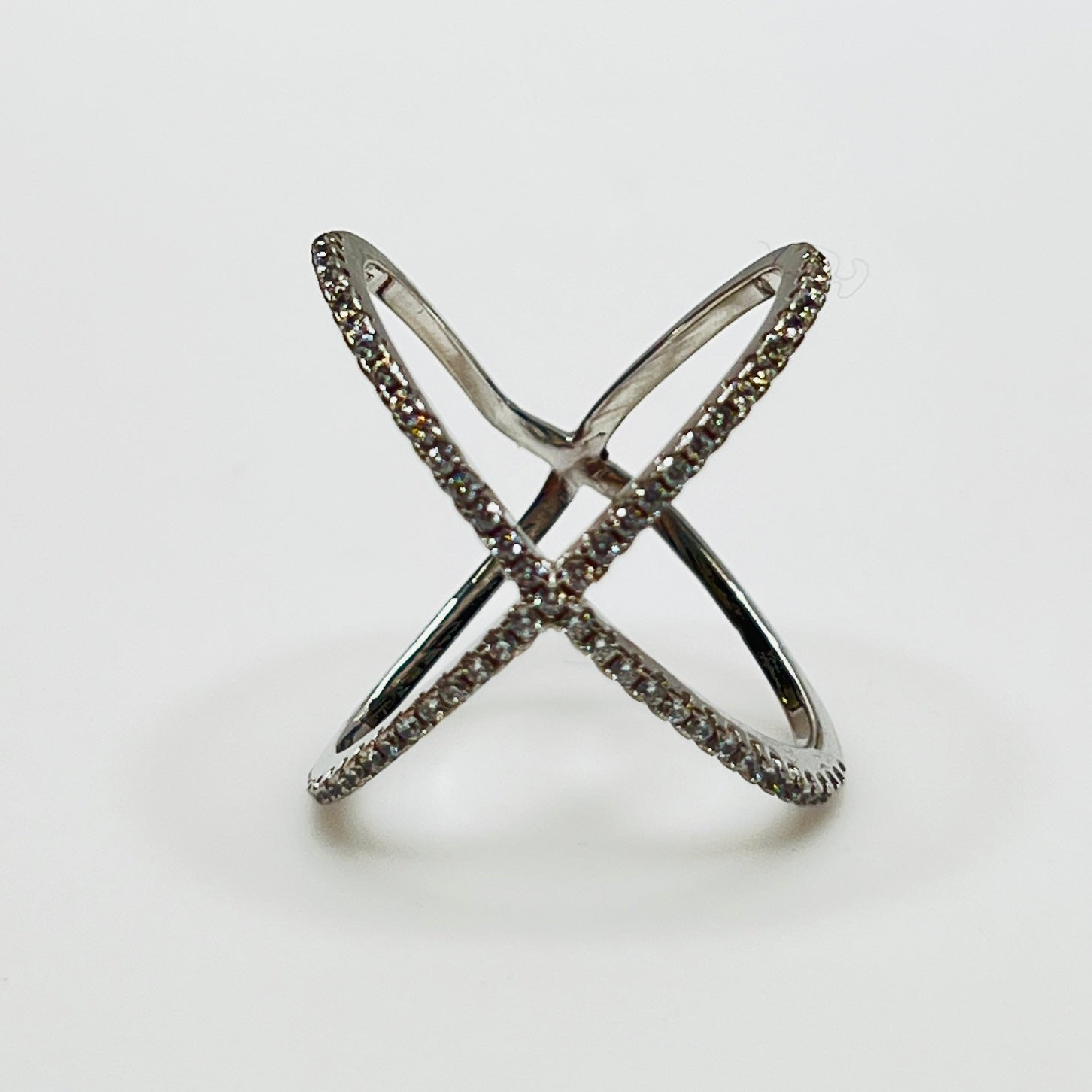 Detail of intersecting pavé CZ bands on silver ring