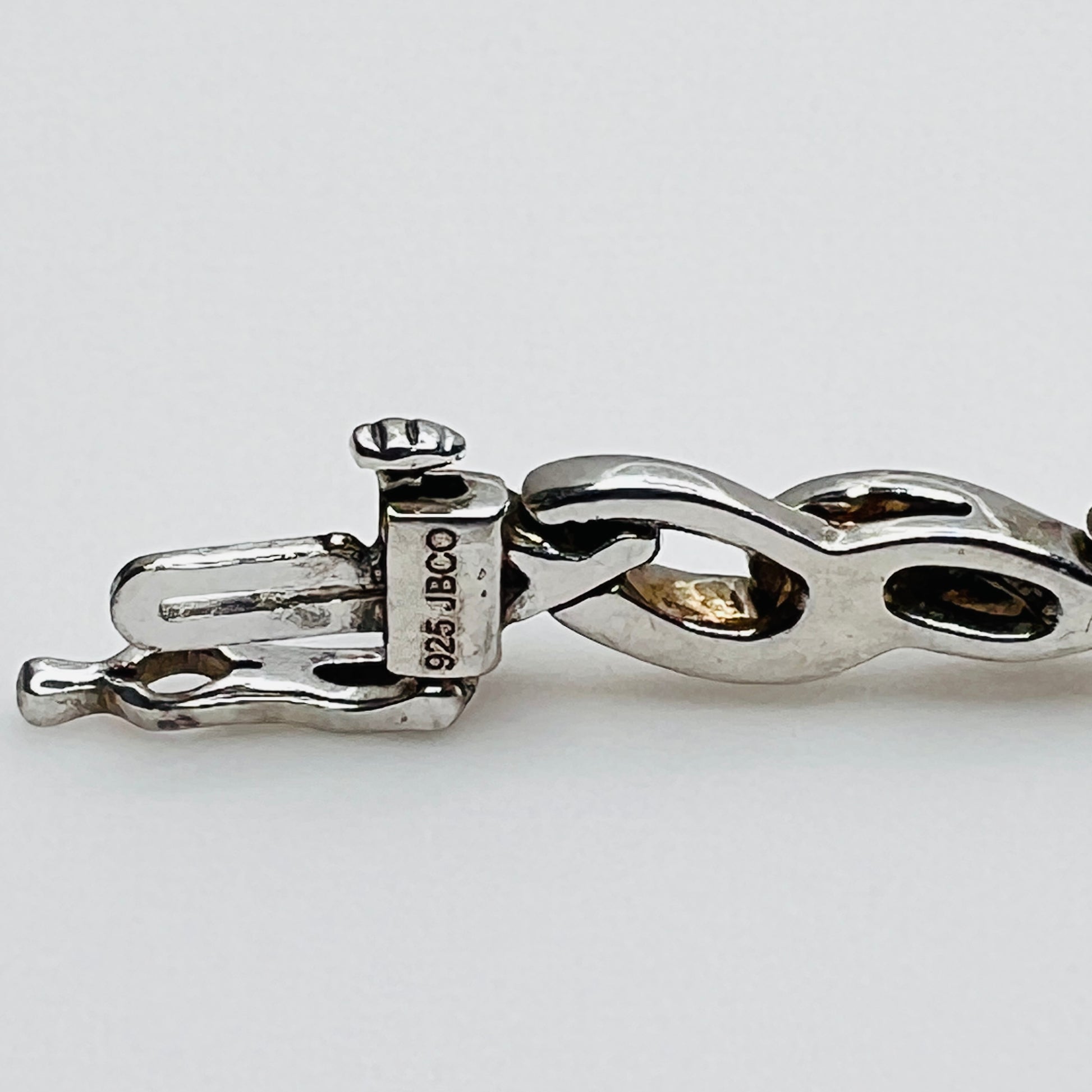 Sterling silver diamond link bracelet view of sterling and makers mark