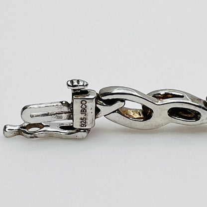 Sterling silver diamond link bracelet view of sterling and makers mark