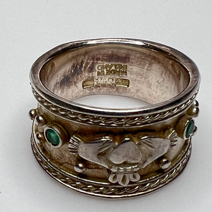Sterling silver Claddagh cigar band ring with green stone, front view