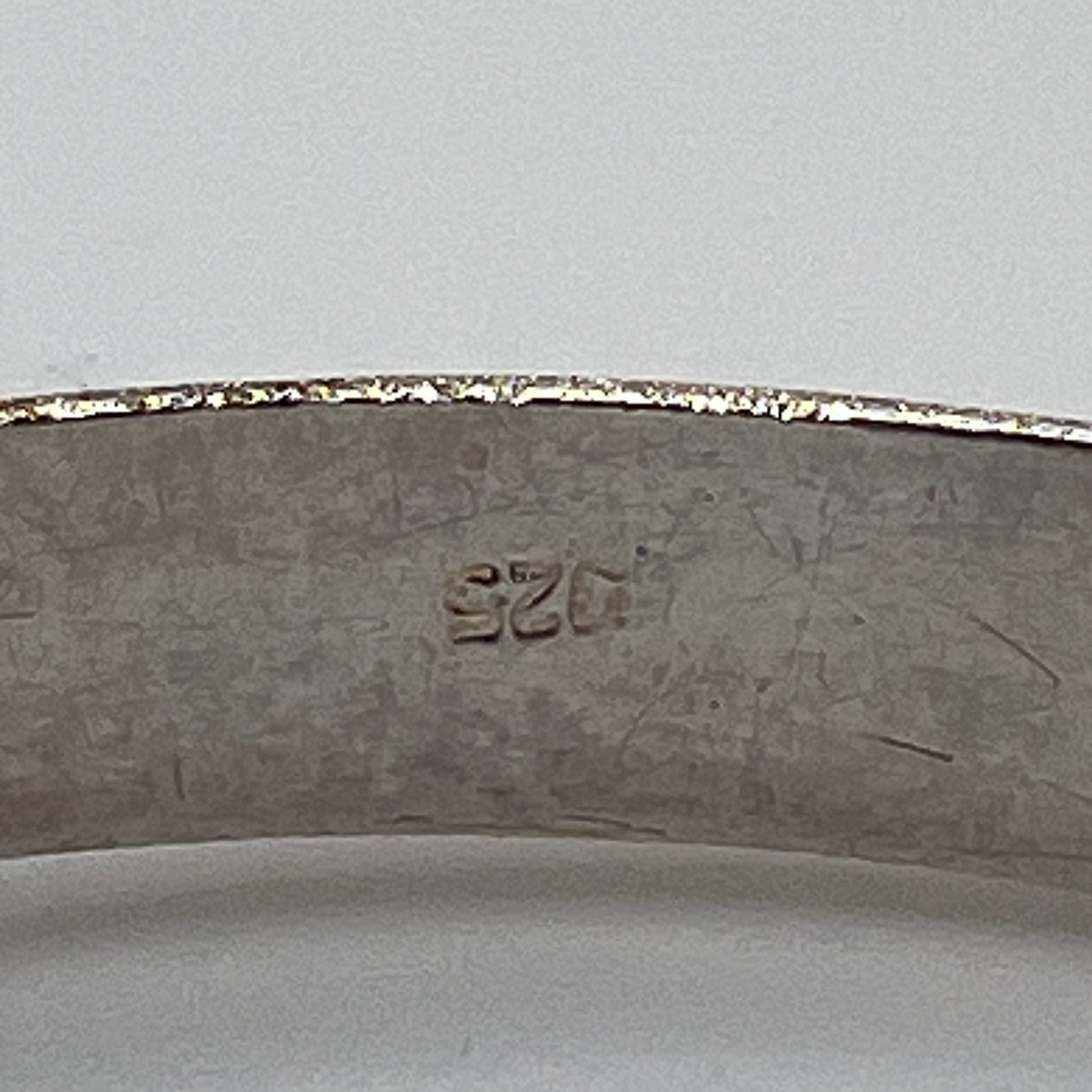 Vintage sterling silver hinged bangle with etched floral scroll design