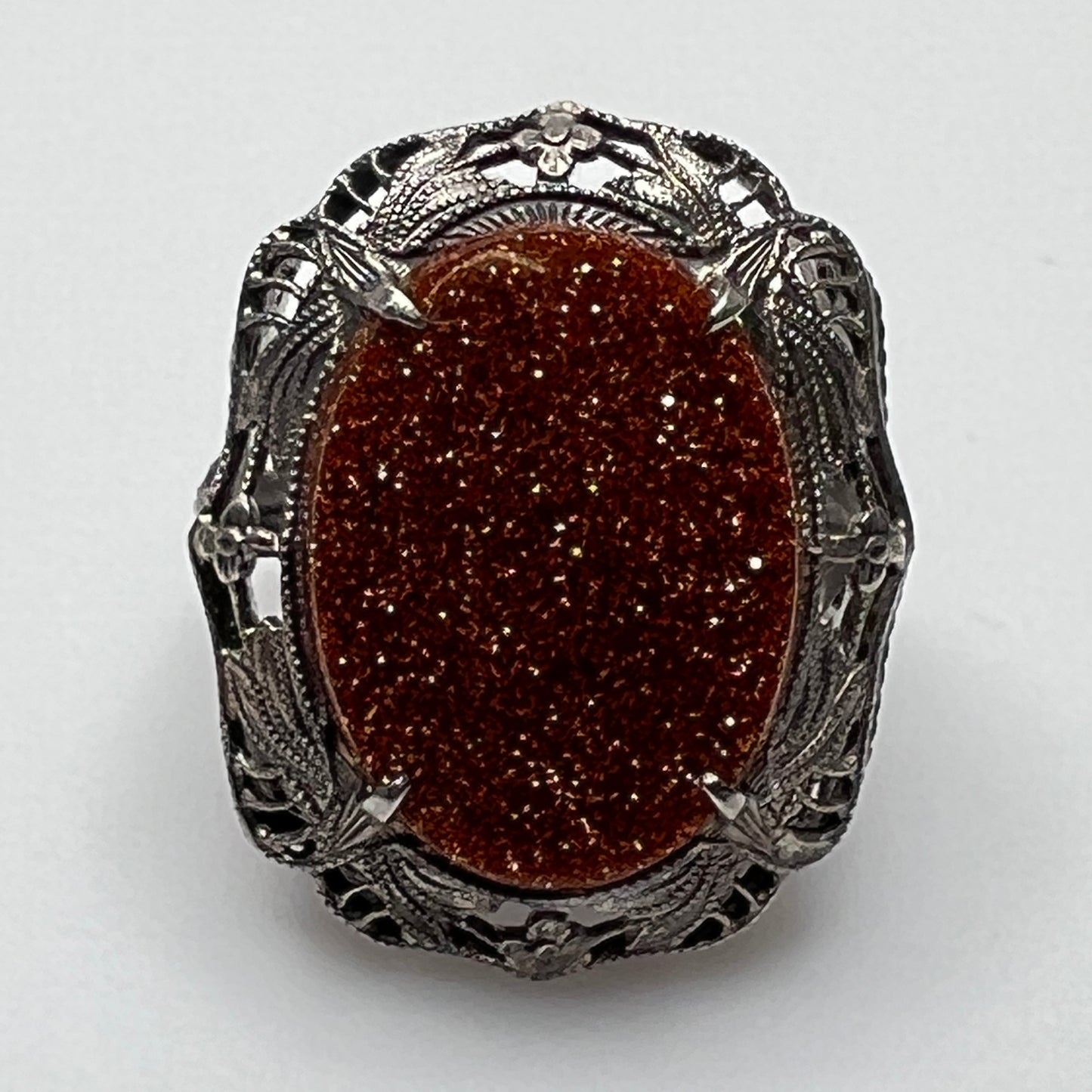 Art Nouveau-style filigree ring with bronze goldstone, size 5