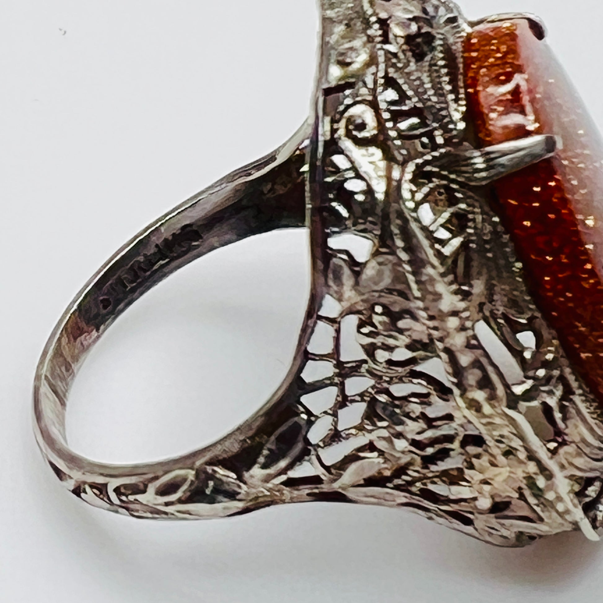 Statement vintage ring with ornate sterling floral filigree and oval goldstone