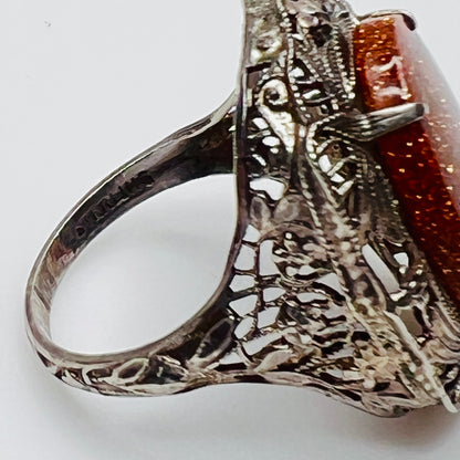 Statement vintage ring with ornate sterling floral filigree and oval goldstone