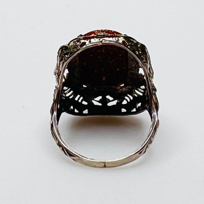 Statement vintage ring with ornate sterling floral filigree and oval goldstone