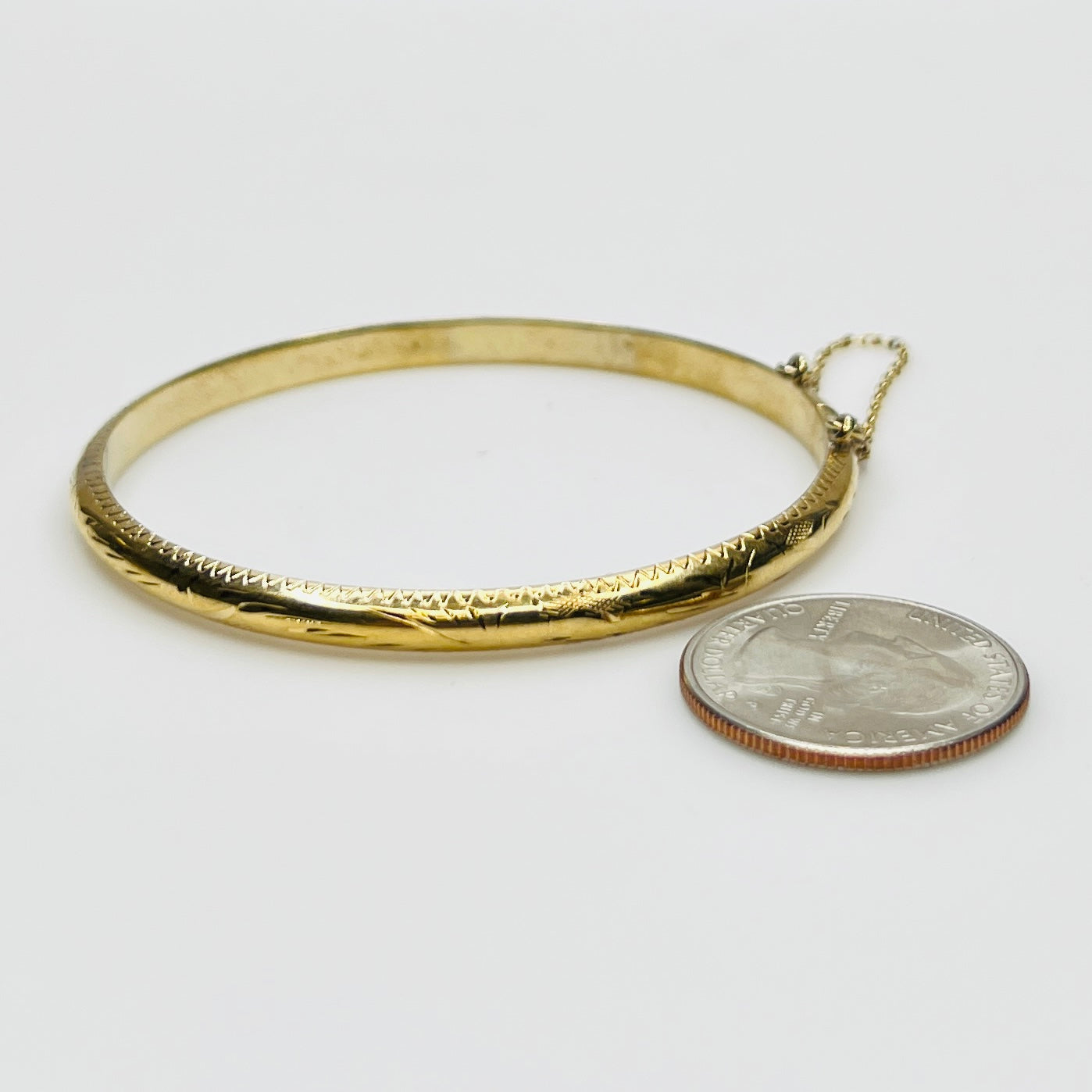 Gold vermeil etched bangle bracelet with floral design