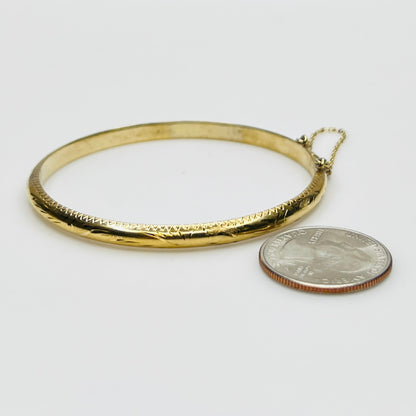 Gold vermeil etched bangle bracelet with floral design