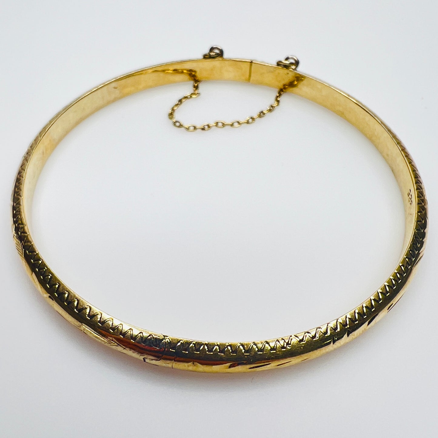 Gold vermeil etched bangle bracelet with floral design
