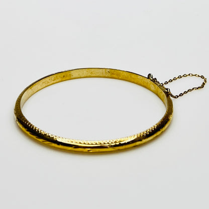 Gold vermeil etched bangle bracelet with floral design