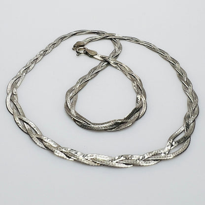 Flat twisted sterling silver necklace in woven design