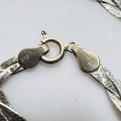 Close-up of clasp stamped Italy 925 and CLO maker’s mark