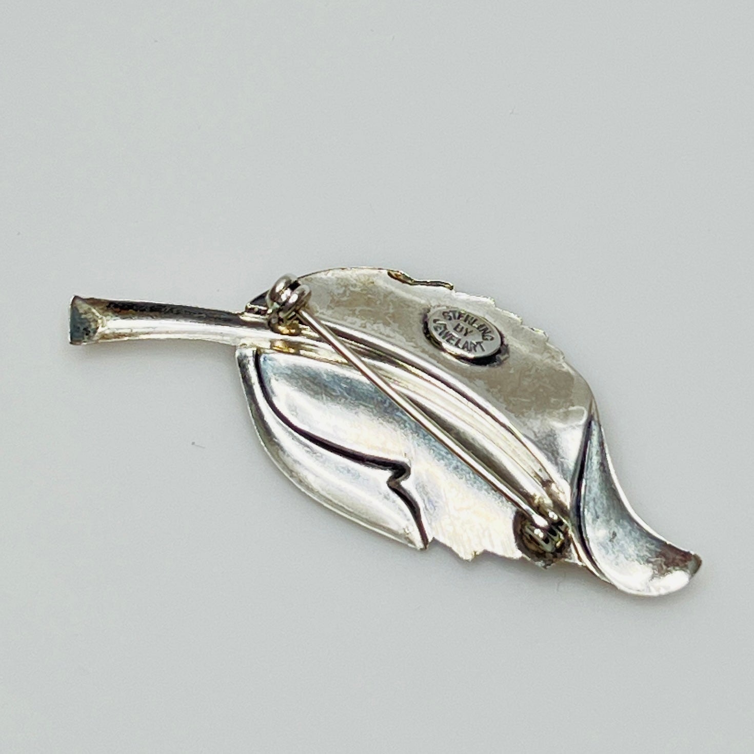 Sterling silver leaf brooch with etched veining, signed Jewelart