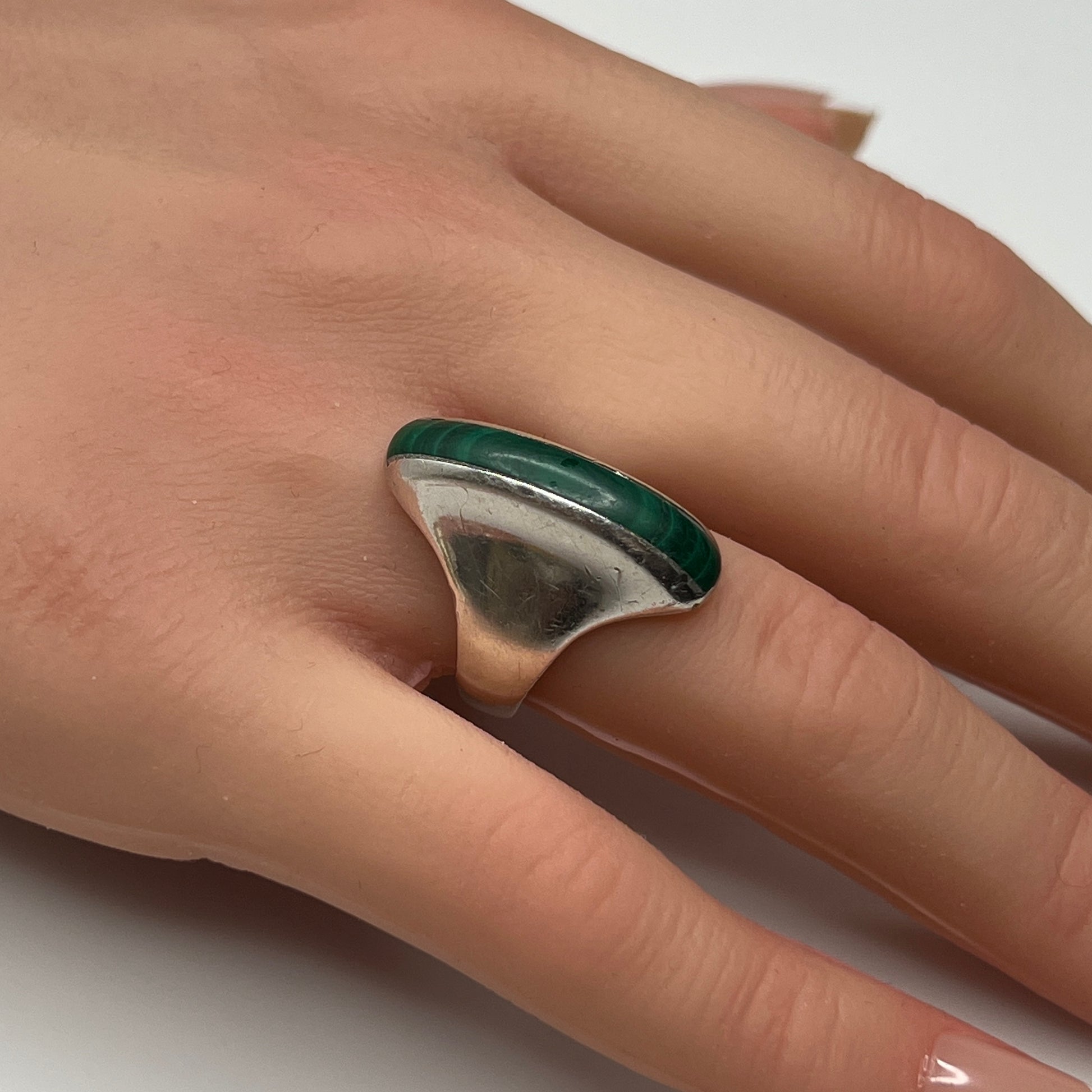 Side view of sculptural 1970s malachite and silver modernist ring