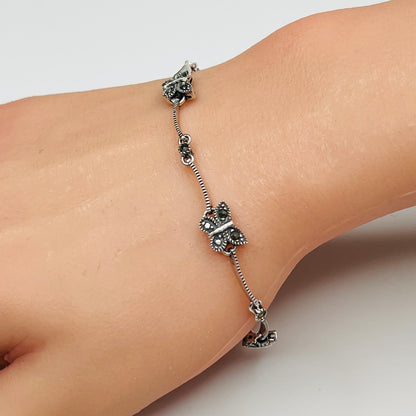 Sterling silver marcasite butterfly bracelet on wrist