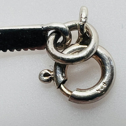 Overhead view of butterfly bracelet laid flat showing clasp and detail