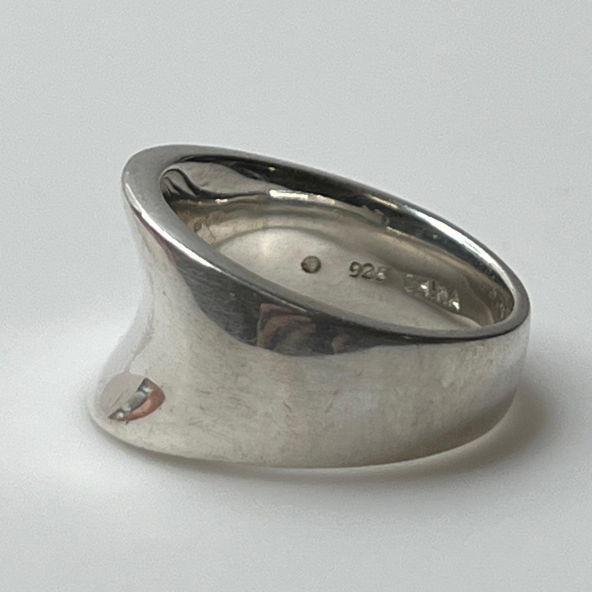 Vintage silver sculptural ring with smooth, polished finish