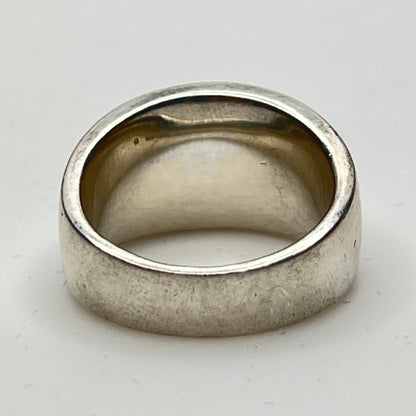 Vintage silver sculptural ring with smooth, polished finish