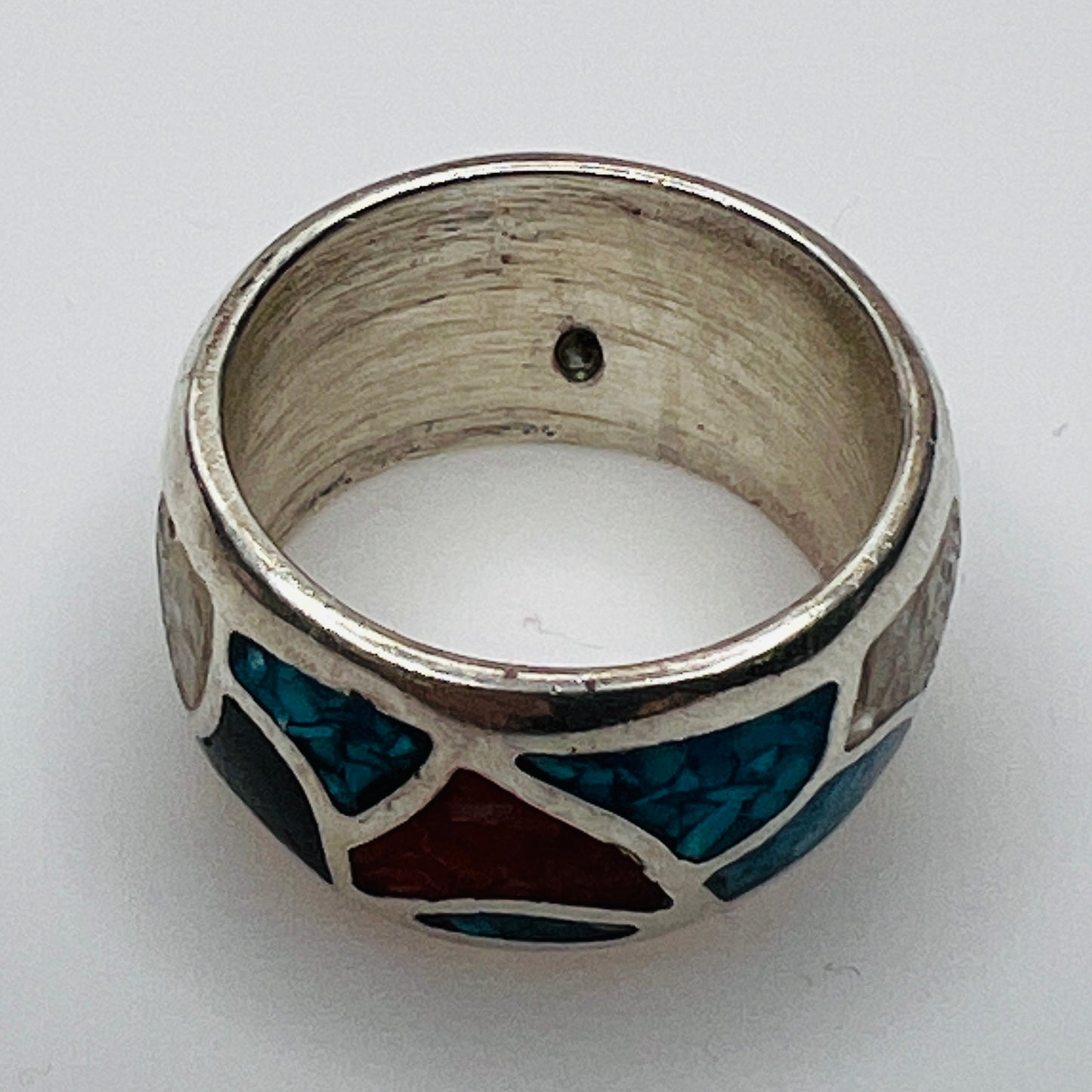 Interior view of silver ring showing small casting bubble in band