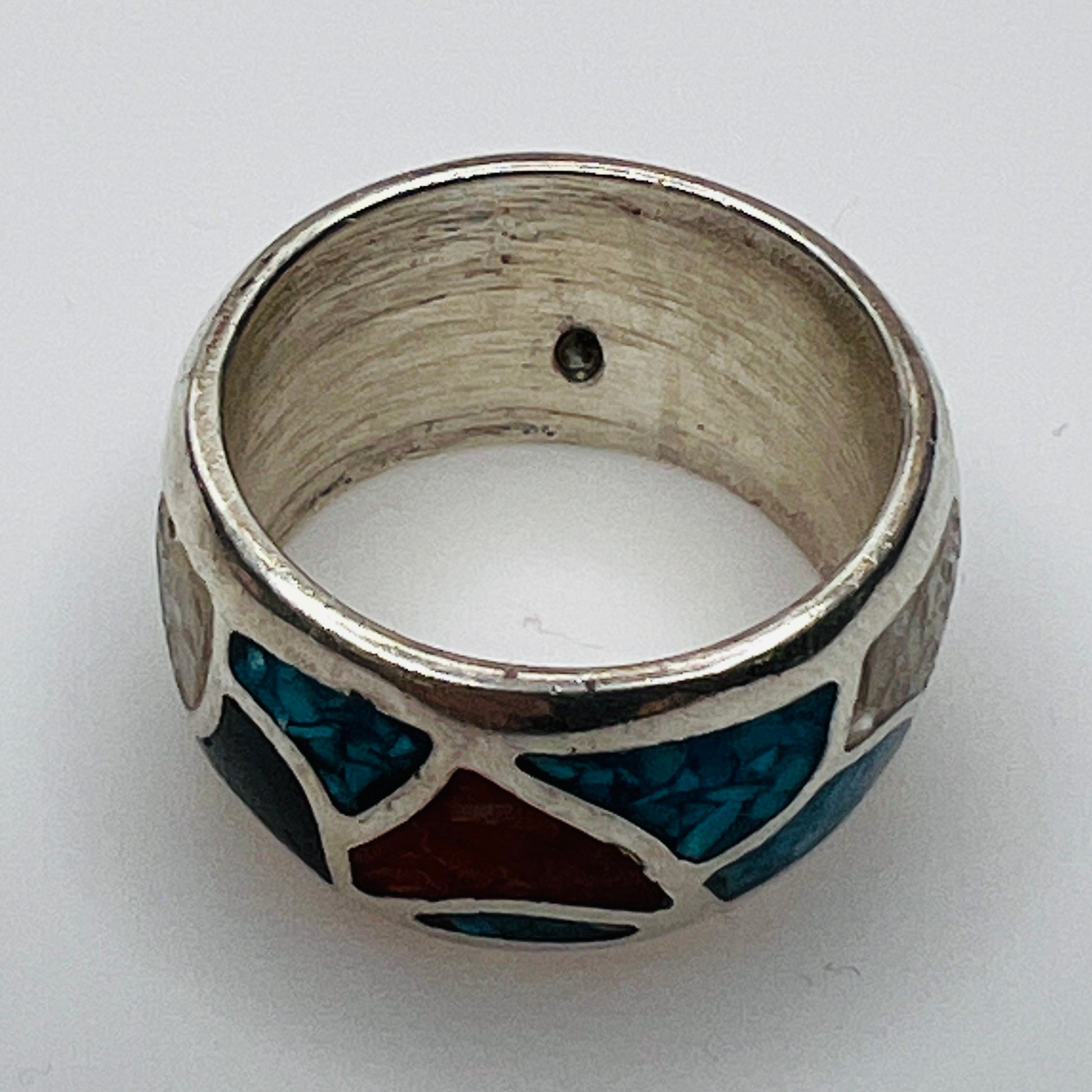 Interior view of silver ring showing small casting bubble in band