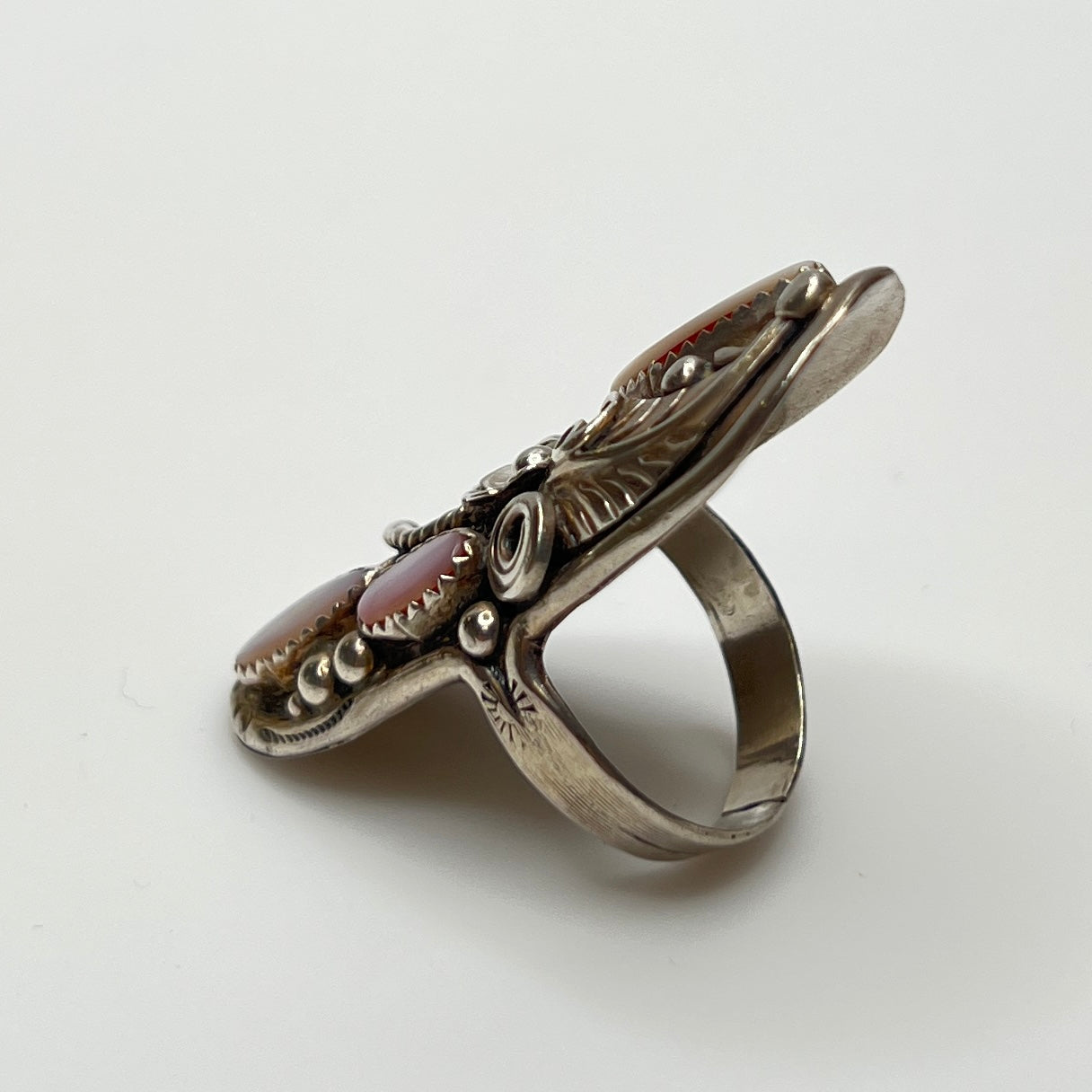 Southwestern vintage ring with floral and feather silver design, size 9