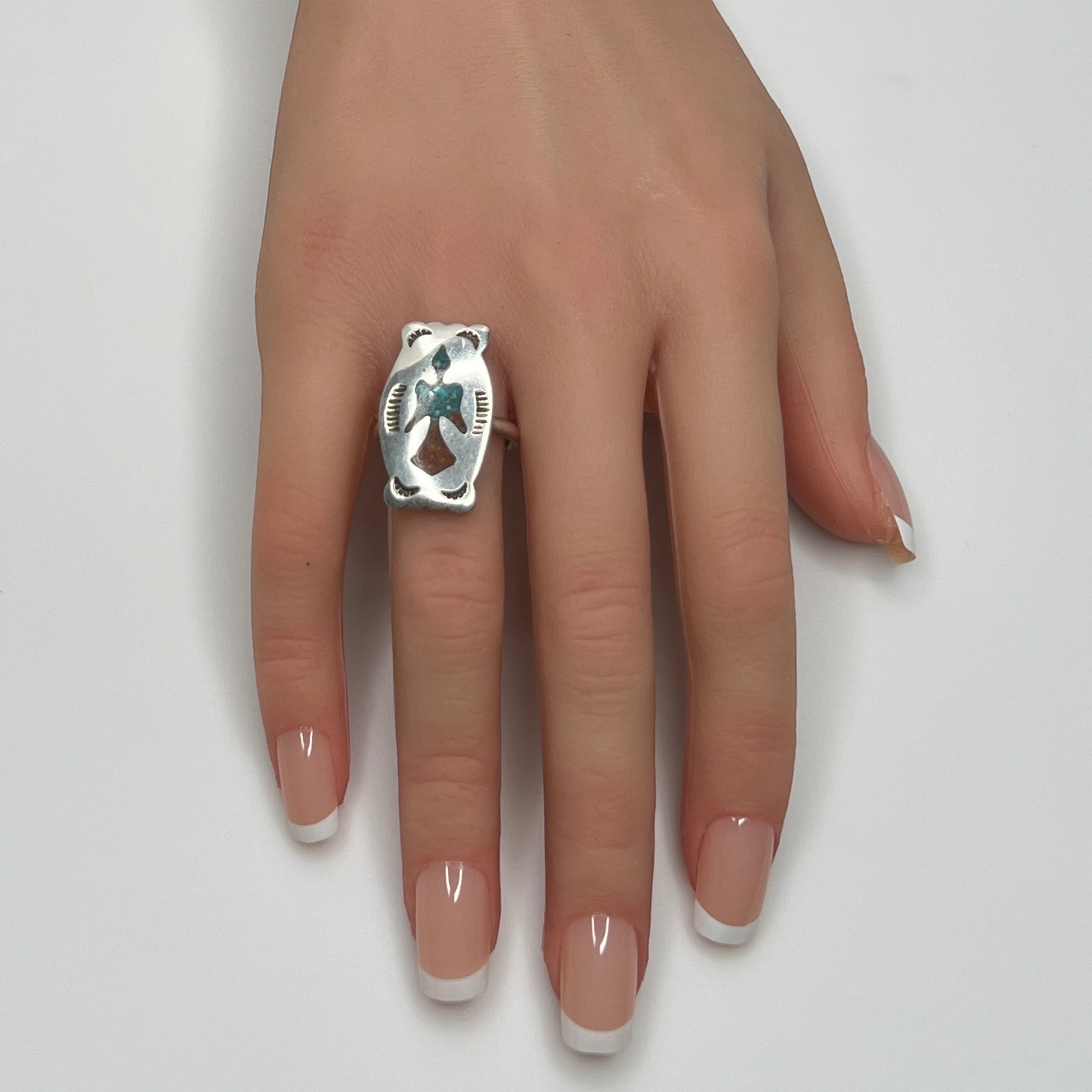 Vintage sterling silver ring with turquoise and coral inlay eagle motif