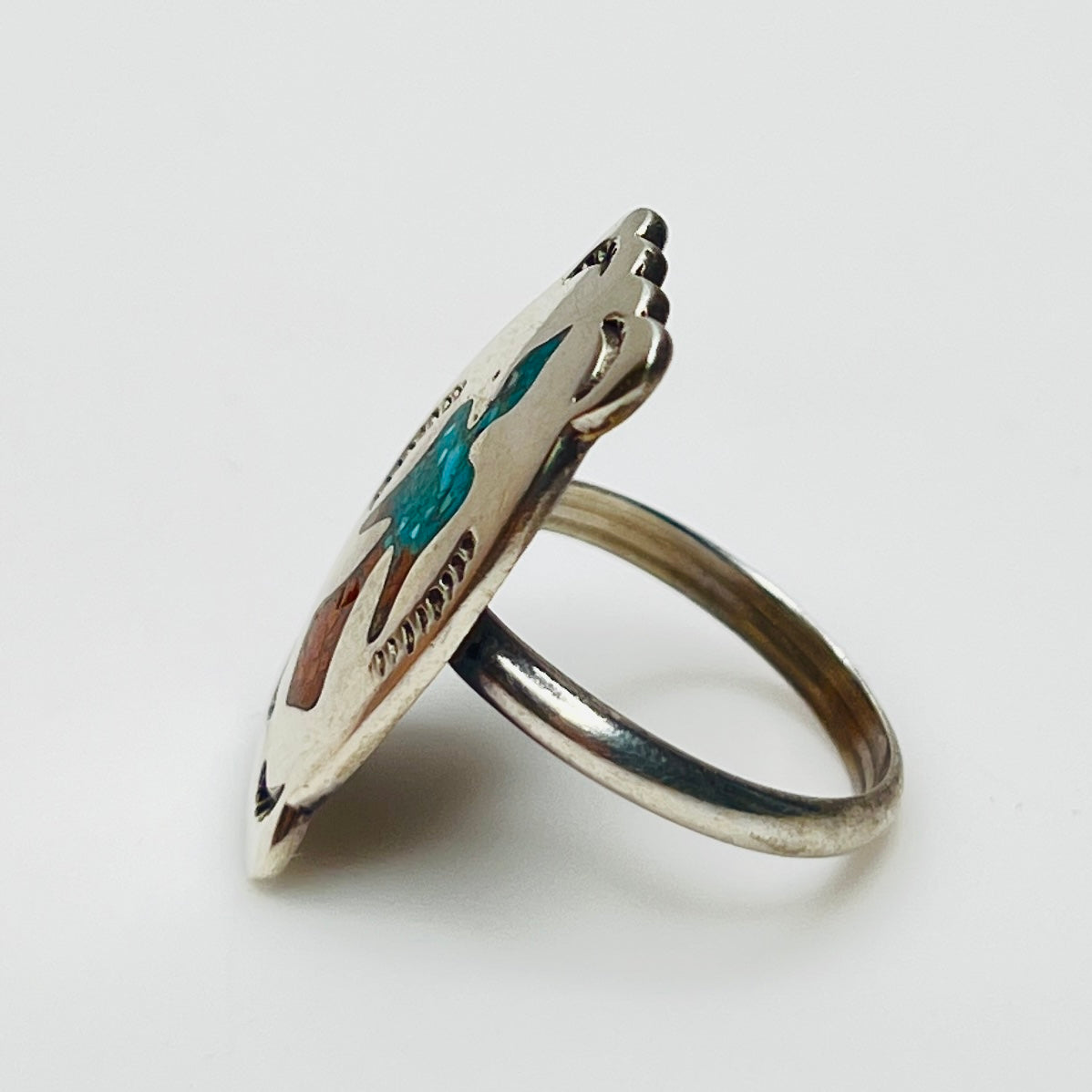 Vintage sterling silver ring with turquoise and coral inlay eagle motif