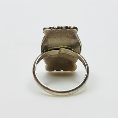 Back view of unmarked vintage sterling silver ring with wide band