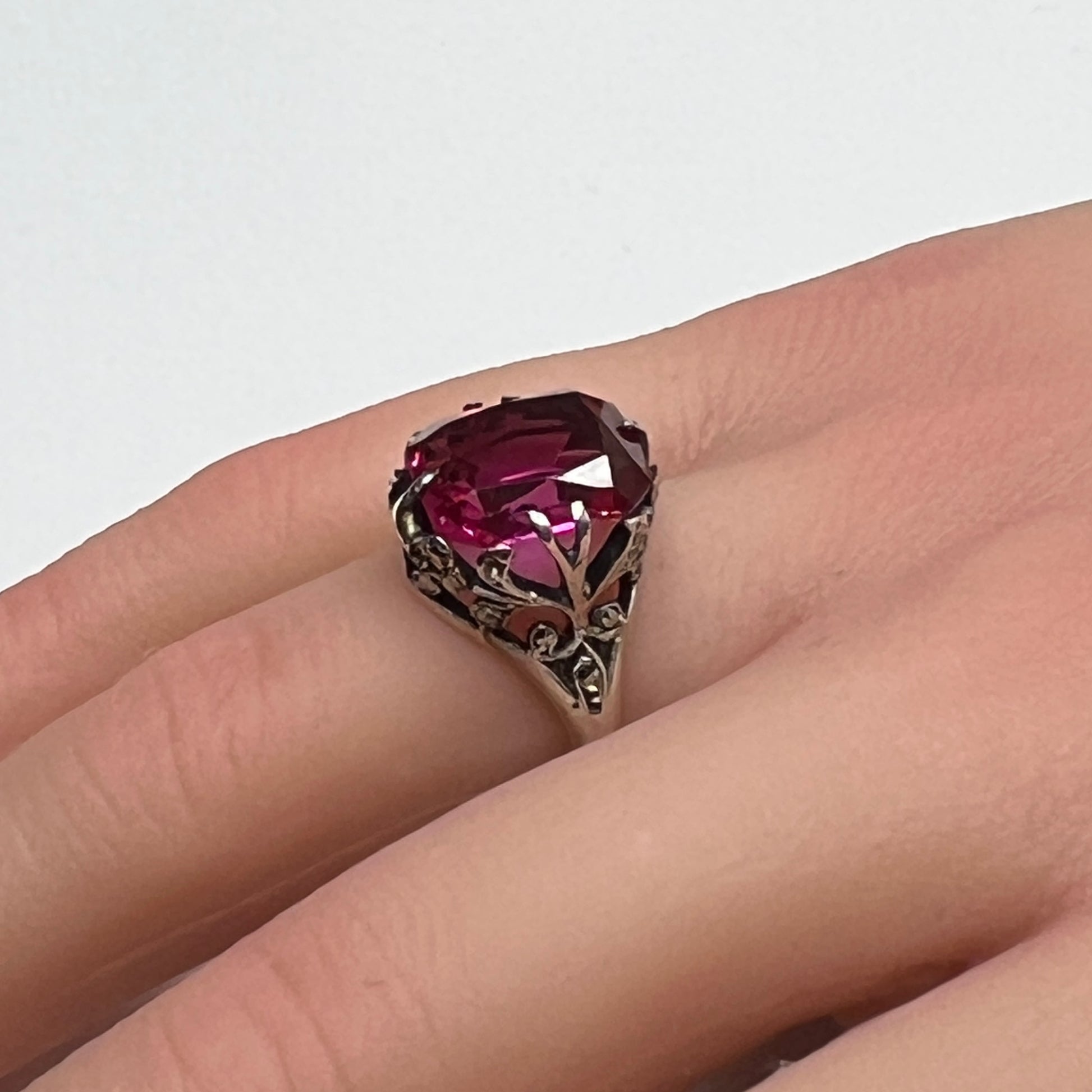 Vintage sterling silver ring with deep pink crystal and marcasite accents
