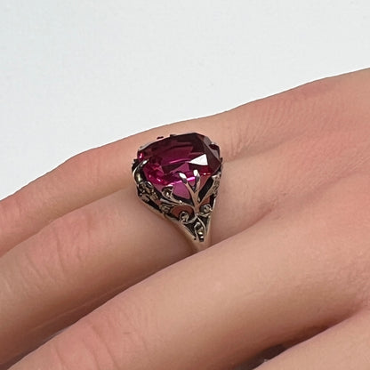 Vintage sterling silver ring with deep pink crystal and marcasite accents