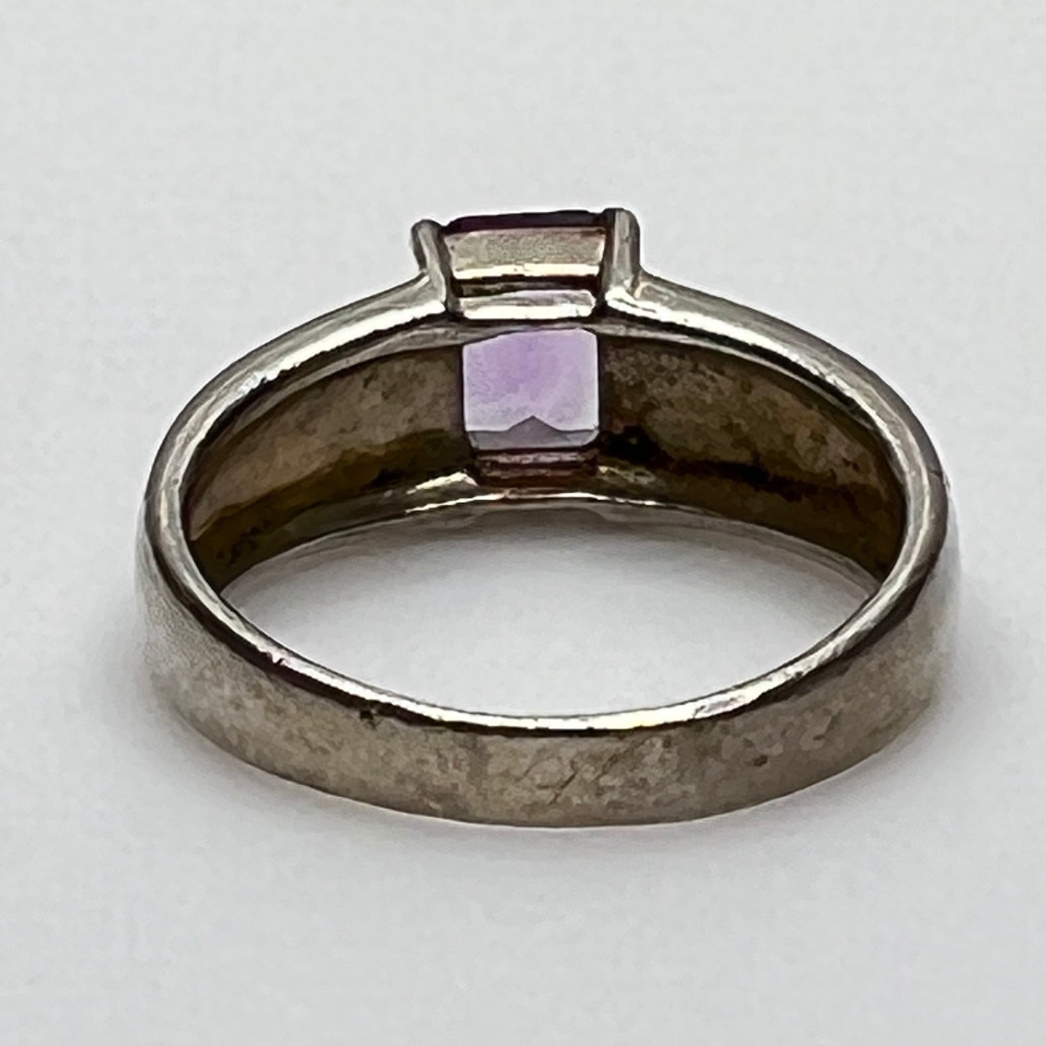 Close-up of vintage Art Deco style silver ring with pale purple spinel