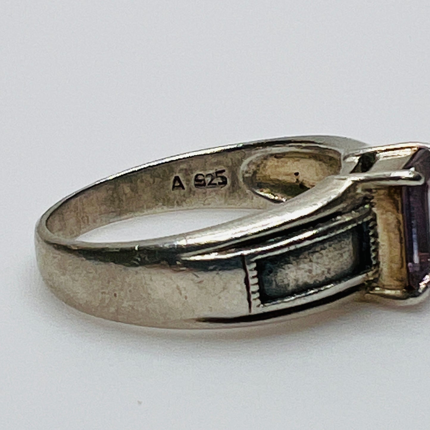 Close-up of vintage Art Deco style silver ring with pale purple spinel