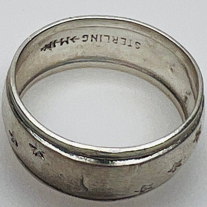 Interior band stamped “STERLING” with maker’s mark