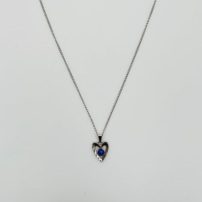 Delicate silver chain with sapphire heart pendant and spring ring clasp