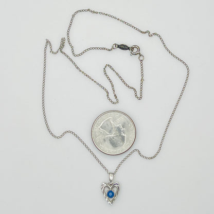 Delicate silver chain with sapphire heart pendant and spring ring clasp