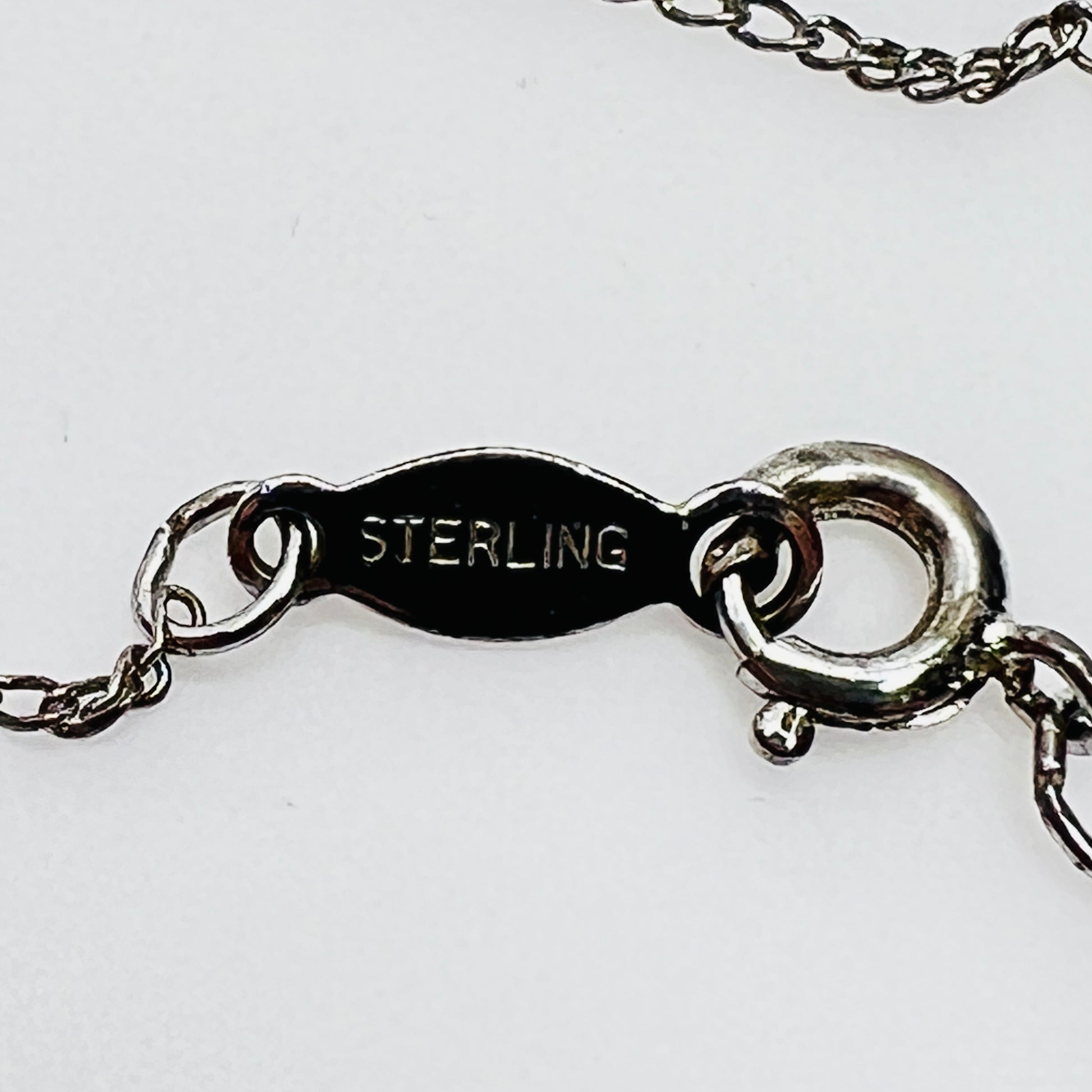 Clasp view showing “STERLING” stamp on link