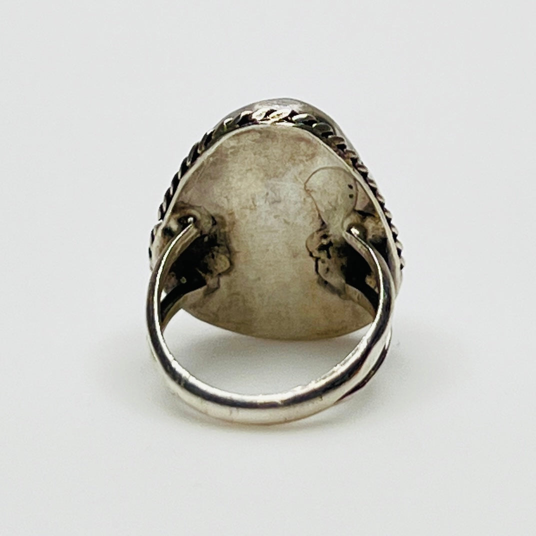 Back view of unsigned sterling silver ring with split band