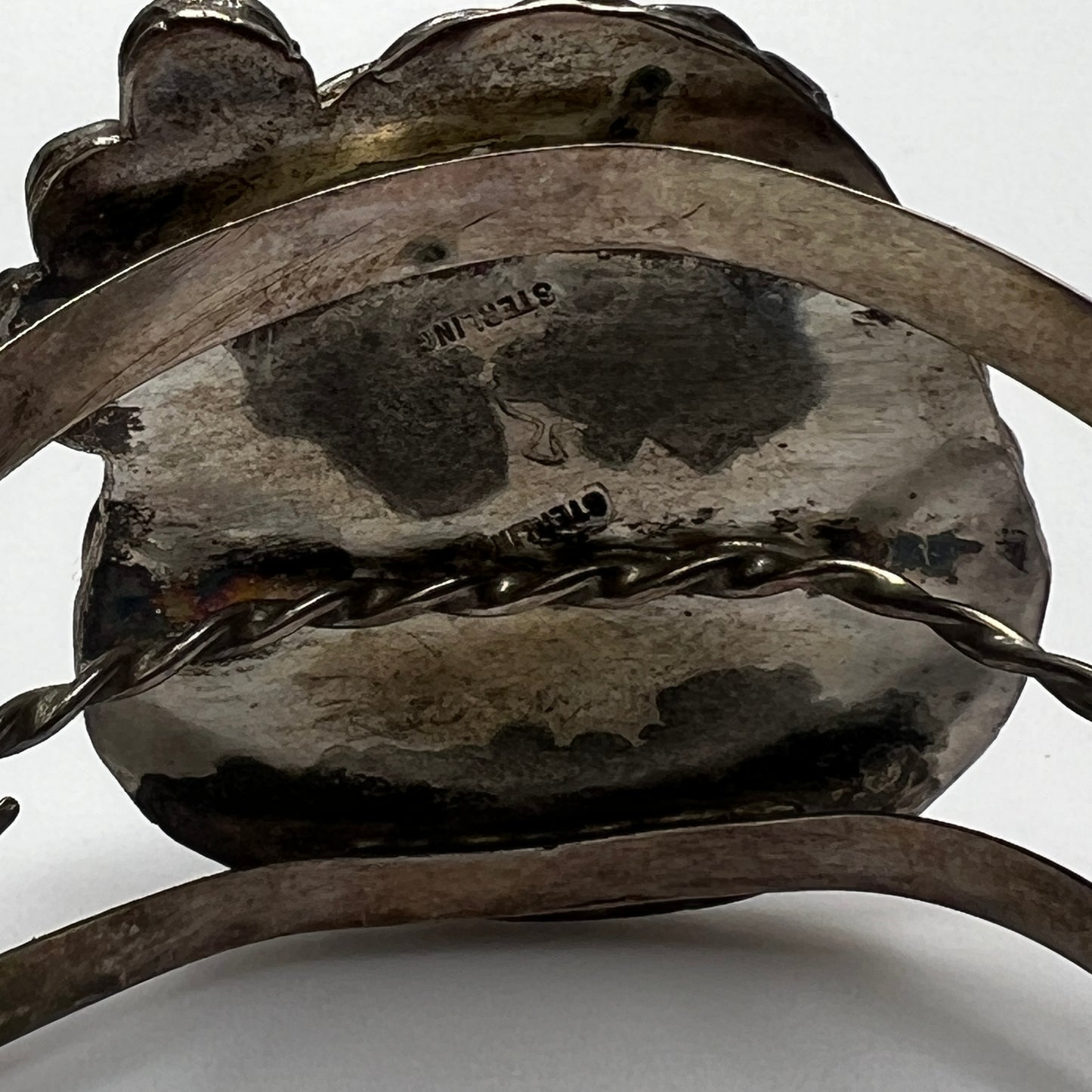 Vintage Native American turquoise and sterling silver cuff bracelet with floral motif