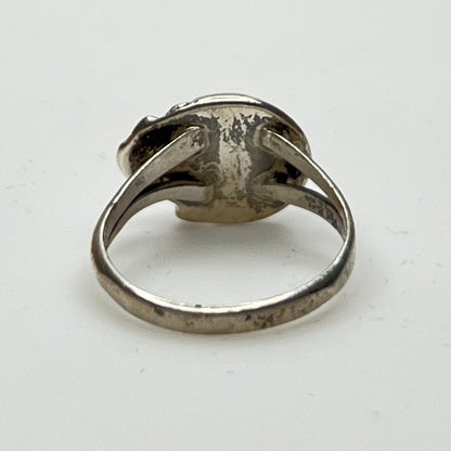 Back view of vintage sterling ring showing split shank band