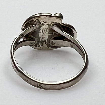 Back view of vintage sterling ring showing split shank band