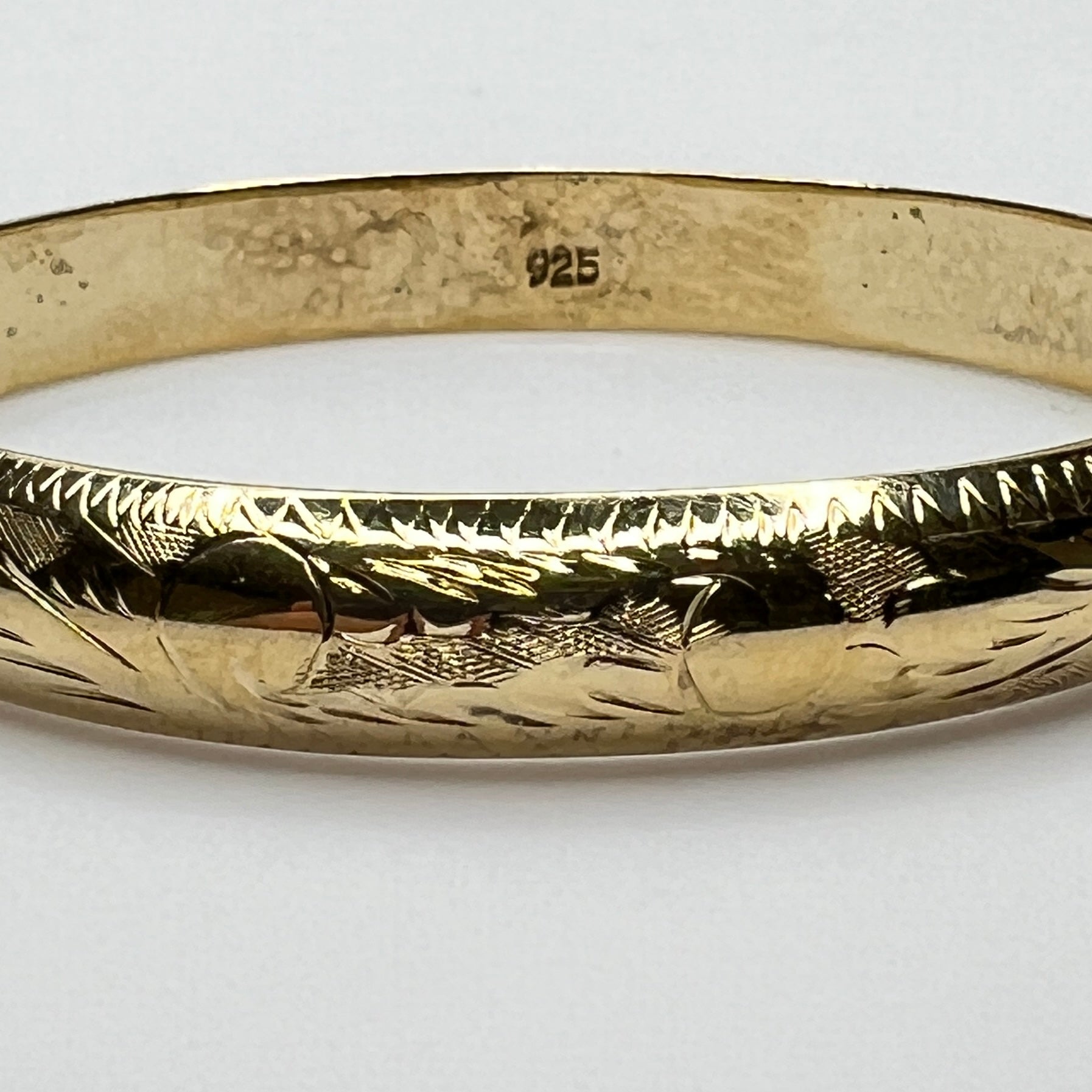 Close-up of bracelet interior showing 925 sterling mark