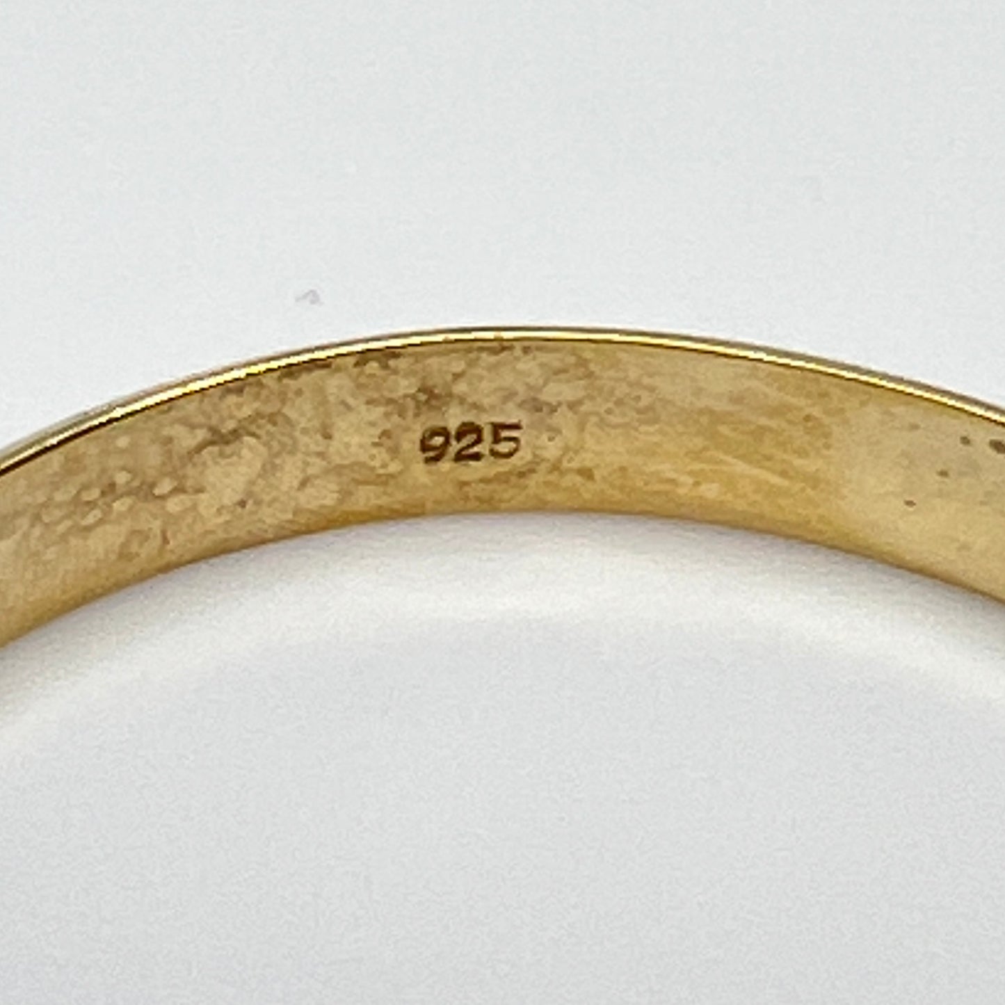 Close-up of bracelet interior showing 925 sterling mark